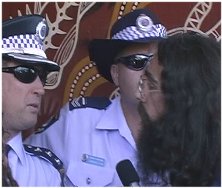 Neil Pike interviewing the Police during the Raid on the Nimbin HEMP Embassy during the Federal Election Campaign on the 31st October 2001.